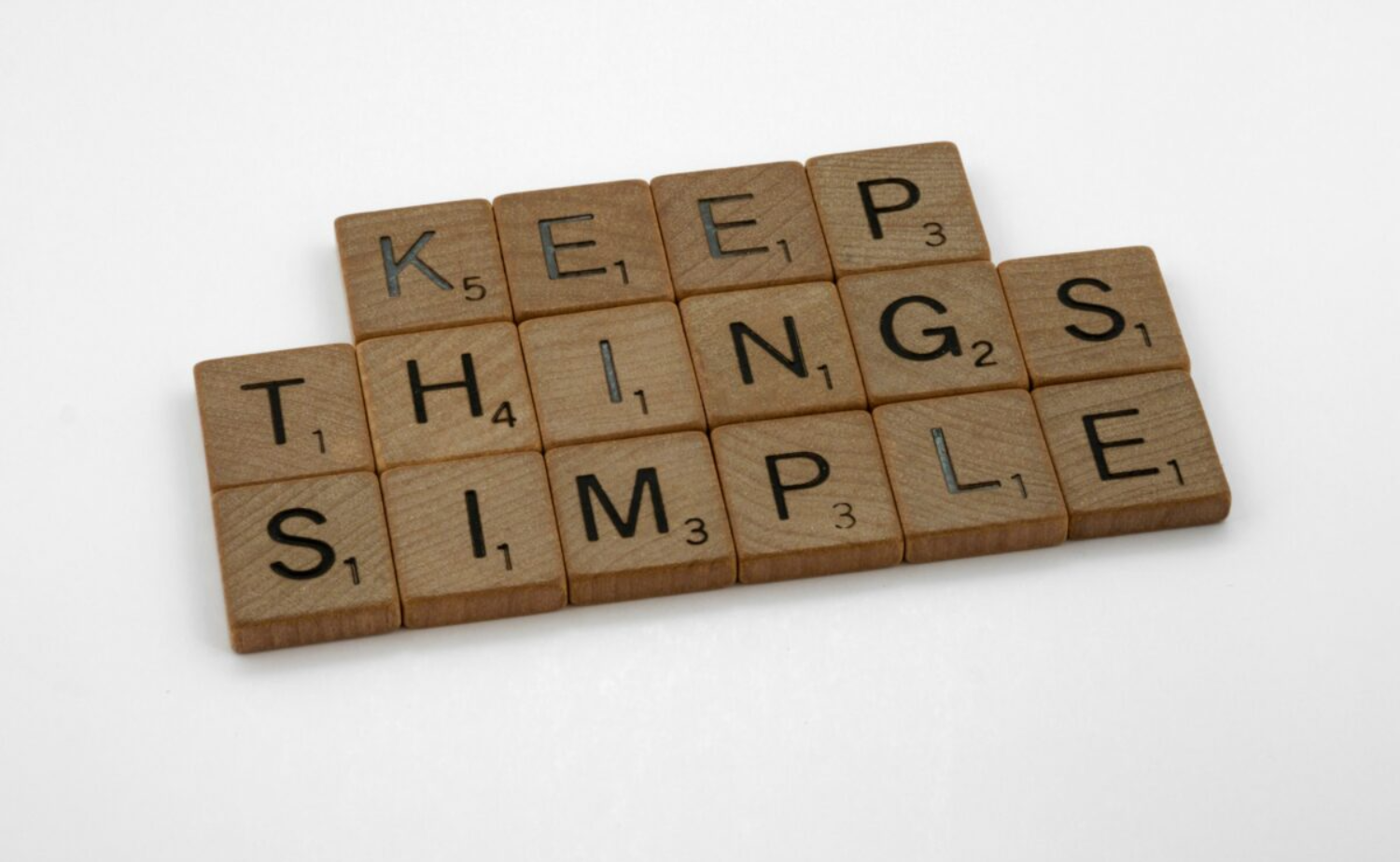 scrabble tiles saying keep things simple