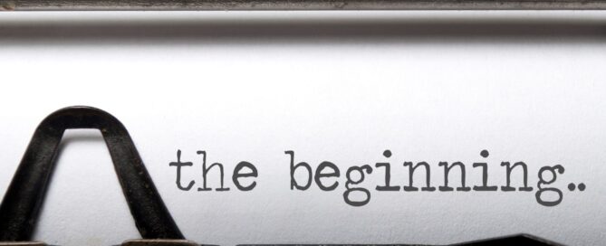 typewriter with text: 'the beginning...'